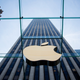 The Apple logo is displayed at the Apple Store June 17, 2015 on Fifth Avenue in New York City.